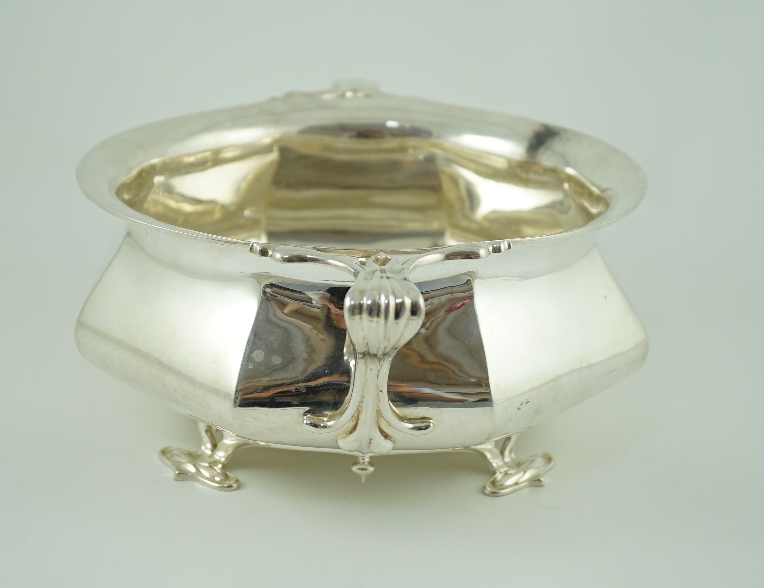 An Edwardian Art Nouveau Scottish silver two handled fruit bowl, by Hamilton & Inches